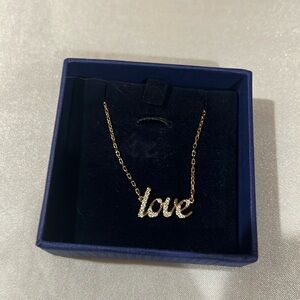 Swarovski necklace with original box.